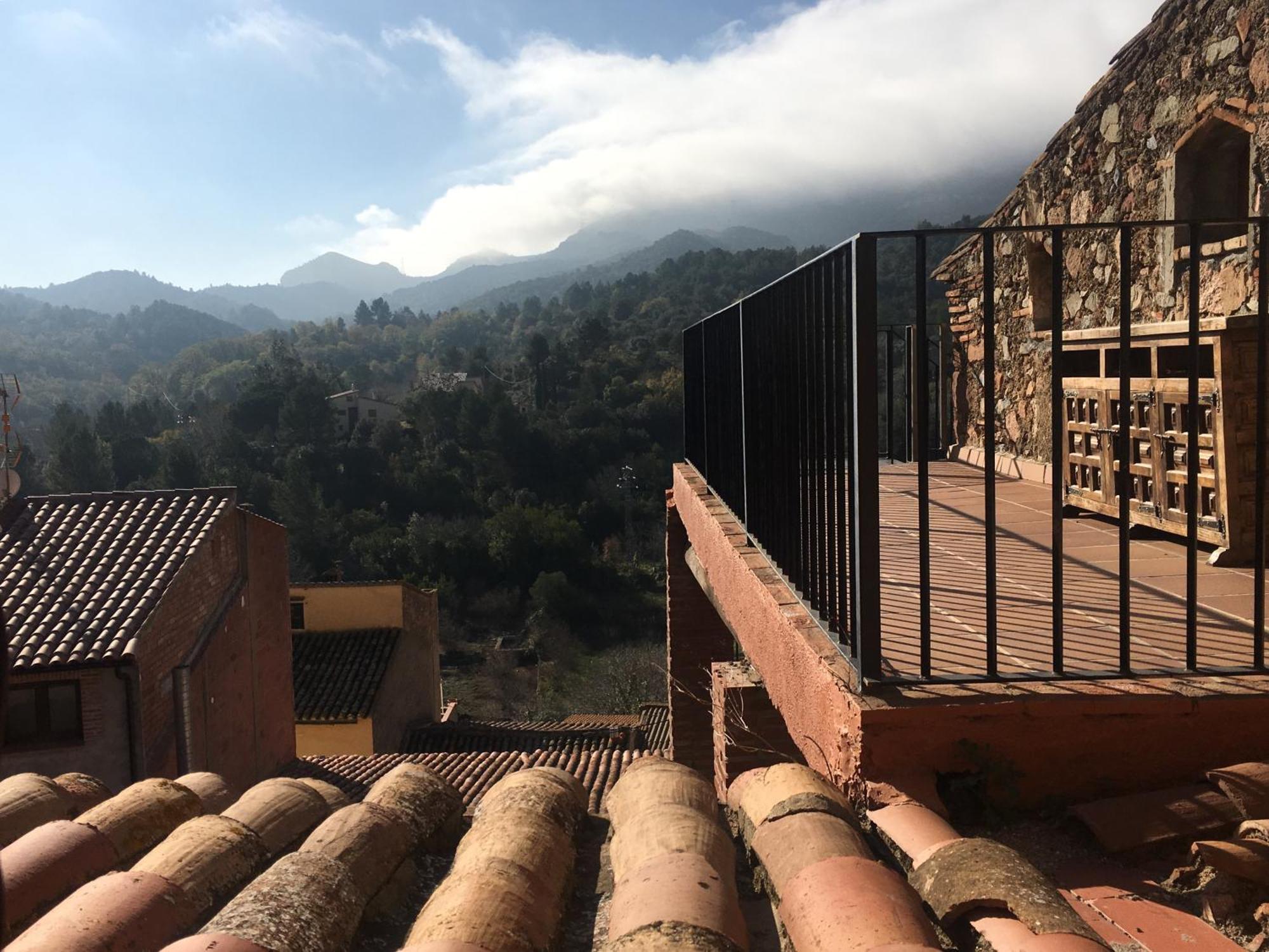Espai Abadia Argentera Rom bilde